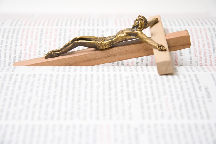 Crucifix In An Open Bible
